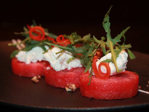 Compressed Watermelon, Arugula, Goat Cheese, and Candied Walnuts