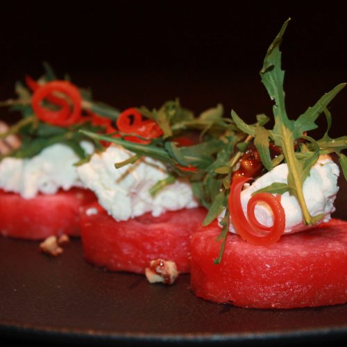 Compressed Watermelon, Arugula, Goat Cheese, and Candied Walnuts